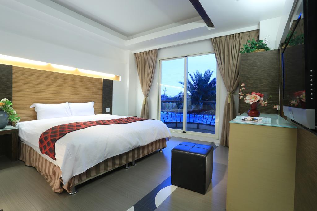 Spring Fountain Hotel Цзяосі Номер фото