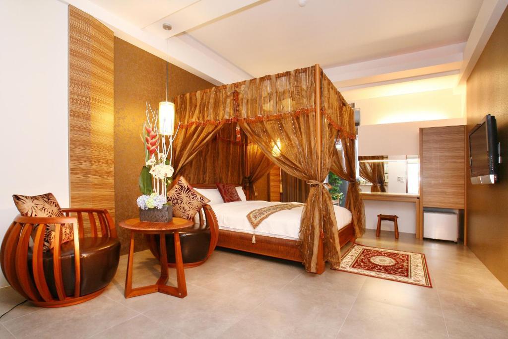 Spring Fountain Hotel Цзяосі Номер фото